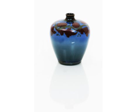A Pilkington's Lancastrian vase by Annie Burton,  shouldered form, painted with a frieze of flowers and foliage in ruby and o