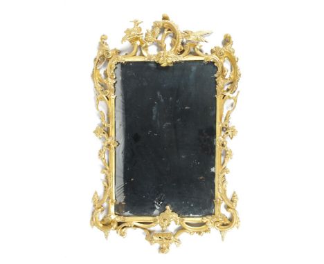 A Chippendale style gilt wood wall mirror, carved wood scroll and bird decoration, 115 x 72cm.