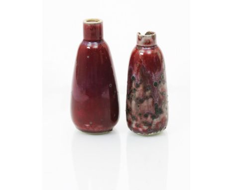 A Ruskin Pottery high-fired stoneware perfume bottle by William Howson Taylor,  shouldered cylindrical form, sang de boeuf wi