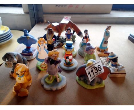 Eleven ceramic Disney figures including a ceramic fox. Not available for in-house P&amp;P 
