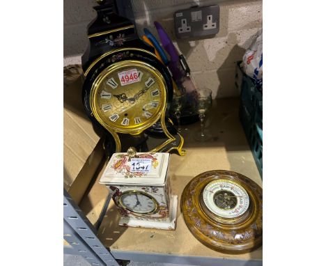 Eluxa mantle clock working at lotting, three uranium glass wine glasses, a masons clock and a barometer. Not available for in