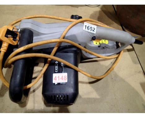 Electric Titan chainsaw. All electrical items in this lot have been PAT tested for safety and have passed. This does not conf