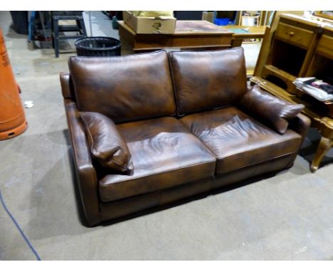 Brown leather two seater sofa. Not available for in-house P&amp;P. 