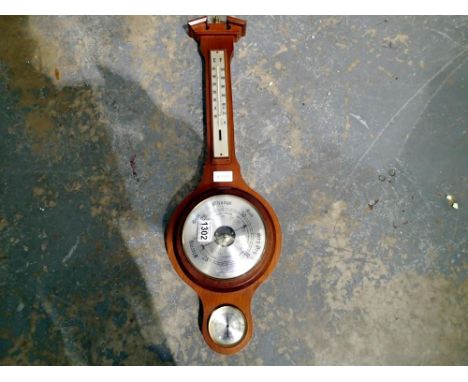 Aneroid barometer/thermometer. Not available for in-house P&amp;P 