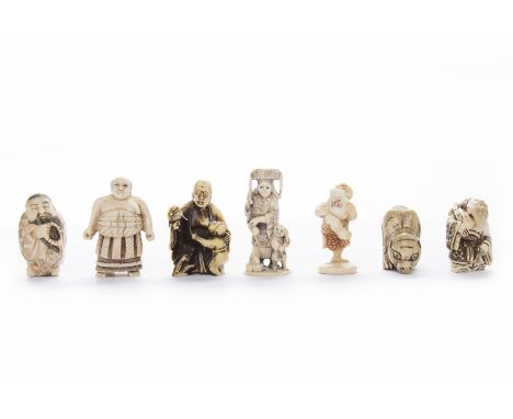 GROUP OF FIVE 20TH CENTURY JAPANESE IVORY NETSUKEeach modelled as a figure, the tallest 5cm high, along with two other netsuk