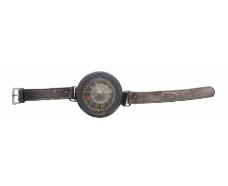WWII German Luftwaffe pilots compass by Kadlec, stamped AK 39, FL 23235, 6 cm diameter, on a leather strap* believed to be a 