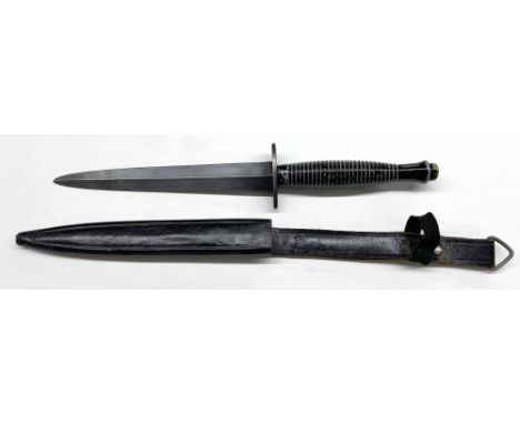 Commando knife, 11" long overall, with a leather scabbard