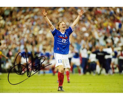 Football Emmanuel Petit signed 12x8 inch colour photo pictured while playing for France. Good condition. All autographs are g