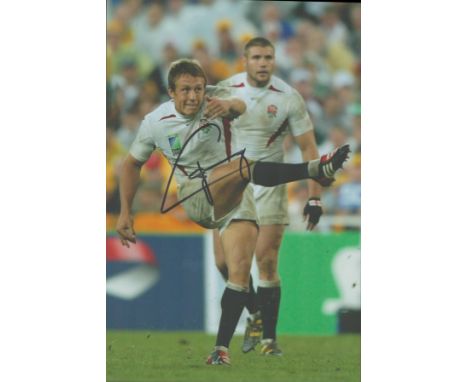 Jonny Wilkinson signed 12x8inch colour England photo. Good condition. All autographs are genuine hand signed and come with a 