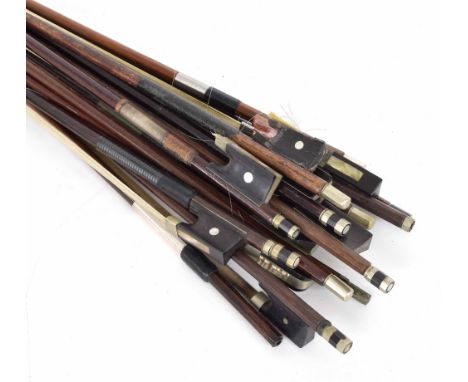 Small bundle of bows, one bow stick stamped E. Sartory á Paris