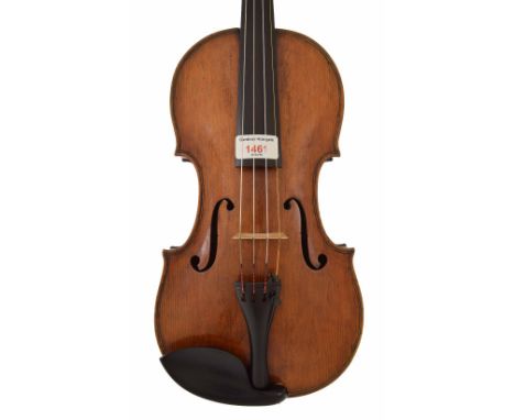 Interesting 19th century violin, unlabelled, the one piece back of faint medium curl with similar wood to the sides and head,