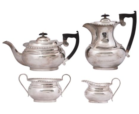 A modern four piece silver serviceSheffield, 1958 by Viner's Ltdof plain oblong bellied form with bead and reel borders, comp