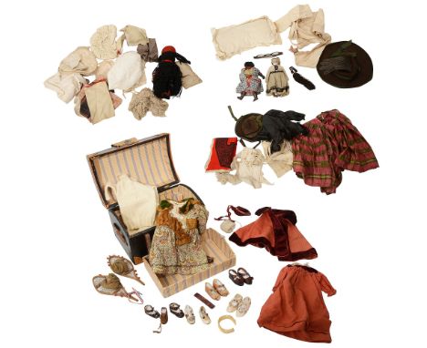 A collection of late 19th and later dolls clothing and dollsincluding: a dolls domed top trunk with carrying handles to sides