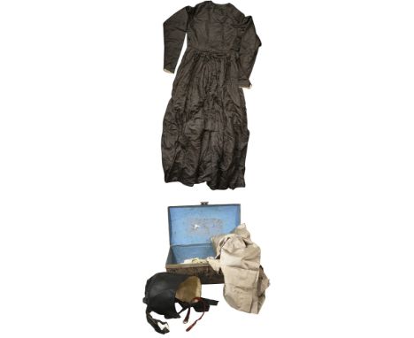 A mid 19th century Quaker dress, bonnet and accessories c.1850to include a black silk satin dress, a bonnet, and slip on shoe