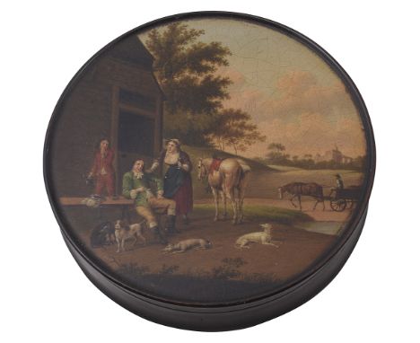 An early 19th century German black lacquer circular snuff box by W.Stockmann &amp; Co. Brunswick c.1820the lid finely painted