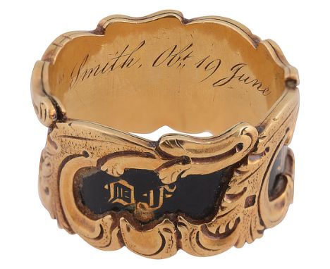 An early Victorian 18ct yellow gold and black enamel memorial ringthe inscribed black enamel band applied with yellow gold en