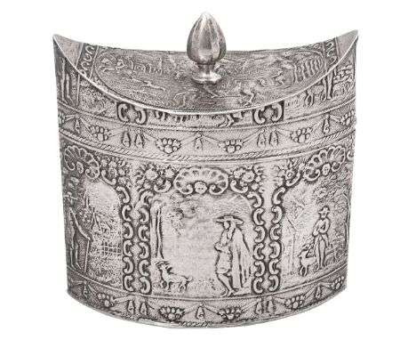 An early 20th century Dutch .833 embossed silver tea caddy dated 1903 of navette form with hinged lid and pointed finial, all