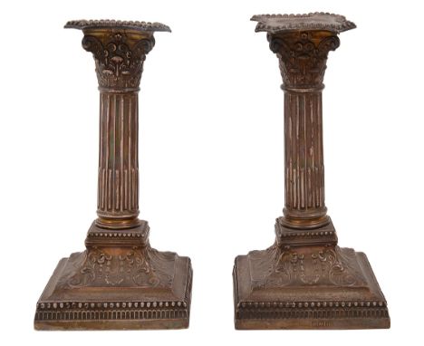 A pair of late Victorian Corinthian column dwarf candlesticksSheffield, 1901 by James Dixon &amp; Sons Ltdstop fluted columns