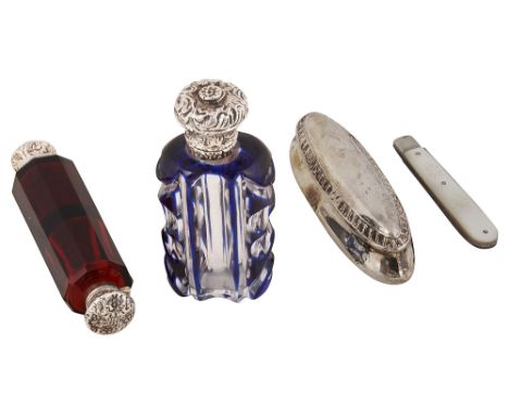 An early Victorian silver mounted blue overlaid cut glass scent bottle, a double ended silver mounted ruby glass scent bottle