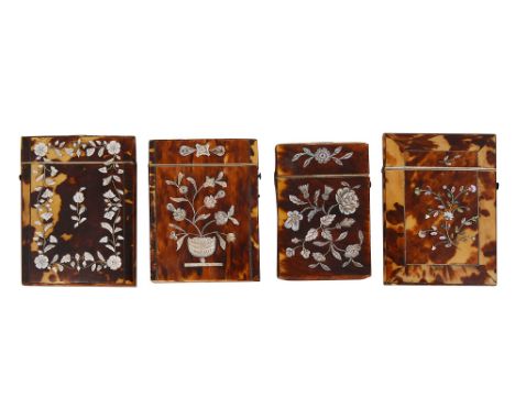 Four early Victorian tortoiseshell card caseseach inlaid with floral sprays in mother of pearl, three additionally inlaid wit