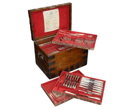 An Elkington &amp; Co silver plate canteen of cutlery in oak chestitems bearing date marks from 1892-1897, and with monograms