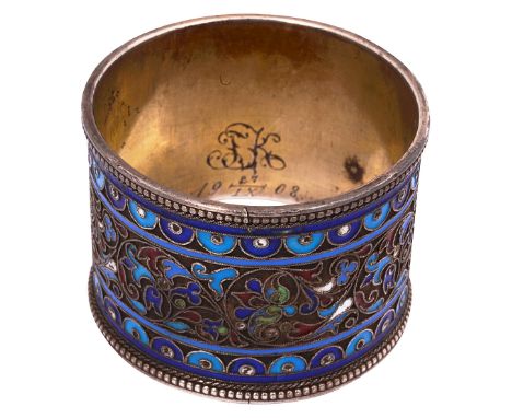 An early 20th century Russian .84 silver-gilt cloisonne enamel napkin ring St Petersburg, makers mark AD, decorated with scro