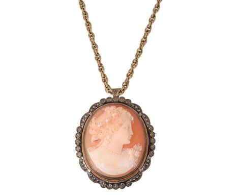 A shell cameo and a chainthe oval shell cameo depicting the head and shoulders of  a young lady  with dressed hair, pendant a