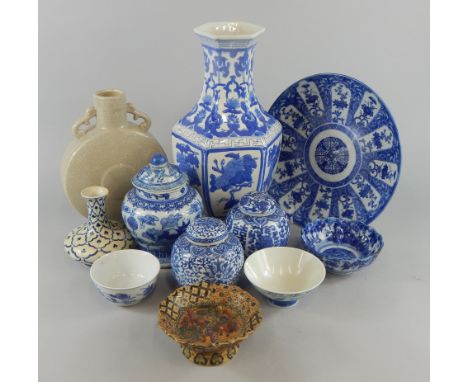 A collection of oriental ceramics, to include a Japanese blue and white charger, a similar bowl, three modern Chinese vases, 