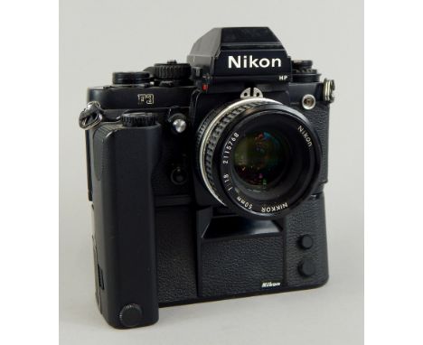 A Nikon F3 camera with motor drive, and 50mm lens.