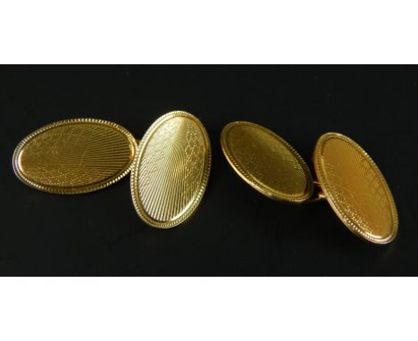 A pair of 18ct gold cufflinks, in engine turned design, 10.3g. 