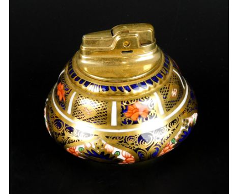 A Royal Crown Derby lighter, fashioned exclusively for Ronson, with purple stamp to underside