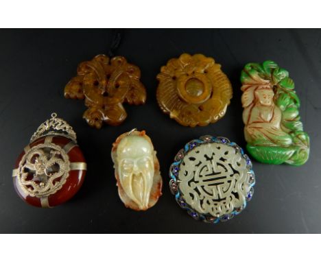 A quantity of modern jade style jewellery, to include carved brooches and pendants. 