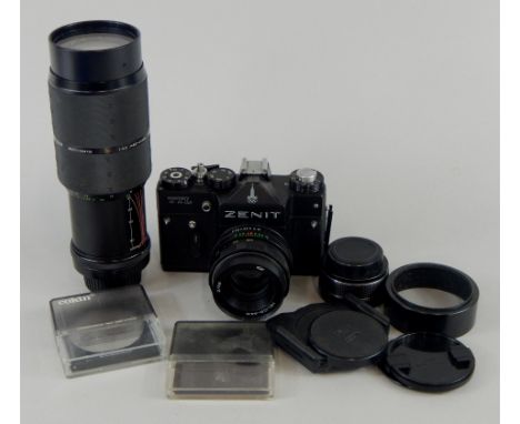 A Zenit camera with lens, a Sigma high speed zoom lens etc.