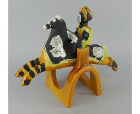 A Retro style ceramic horse, stamped Portanier, and a yellow glazed ceramic stand, possibly for Gilbert Portanier (born 1926)