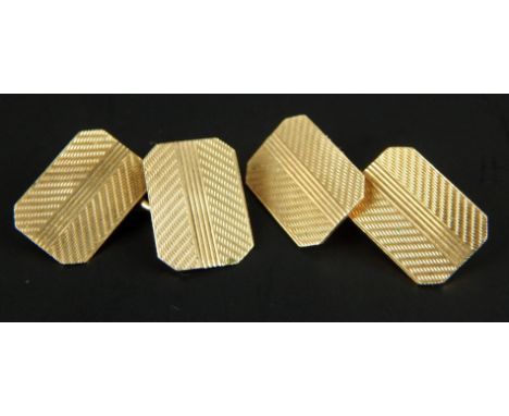 A pair of 9ct gold cufflinks, with engine turned design, 4.9g. 