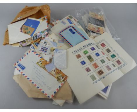 A quantity of first day covers, loose stamps etc.