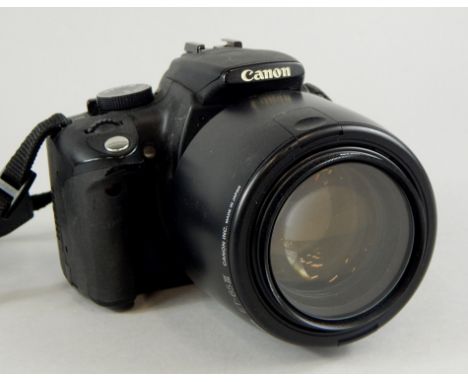 A Canon EOS 350D digital camera, with ET-625 III lens.