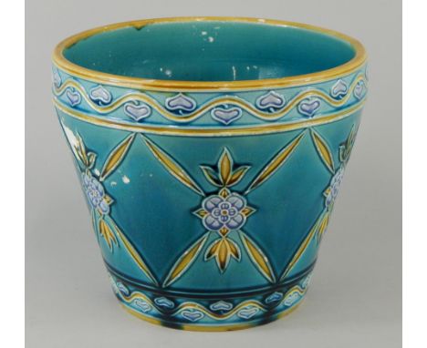 A Minton limited ceramic jardiniere, with raised Art Nouveau style decoration, on a turquoise ground, registration number 616