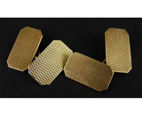 A pair of 9ct gold cufflinks, in engine design, 7.7g.