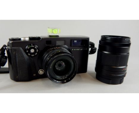 A Hasselblad Xpan camera with Hasselblad 4/45 lens, and 4/90 lens.