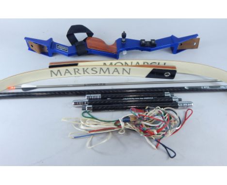 A Marksman Monarch CNC archery bow, made in laminate carbon fiber etc., in fitted case with one arrow.