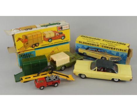 Three die-cast vehicles, a Corgi working conveyor number 64, a Clifford series automobile convertible and a Clifford Toys Lan