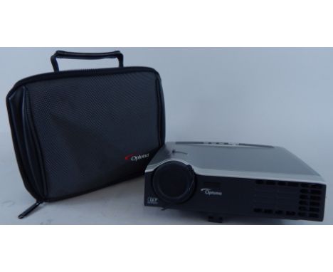 An Optoma projector, with mains lead and connector.