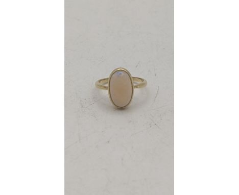 A yellow metal and opal ladies ring tested as 18ct yellow gold, size I½ 2.5gLocationIf there is no condition report shown, pl