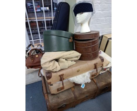 A mixed lot to include fashion items, hat boxes, vintage linen, a violin, recorders, a rainmac, handbags, and a Jean Varon 19