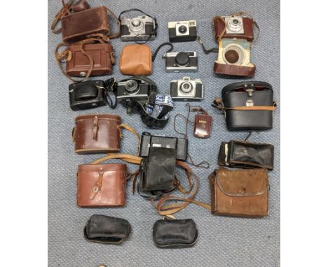 A mixed lot of binoculars and photographic equipment and accessories to include an Instaload 126, two Olympus Trip 35s, and a