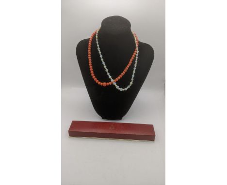 A graduated coral beaded necklace with a 9ct yellow gold clasp together with an opal and pearl style graduated beaded necklac