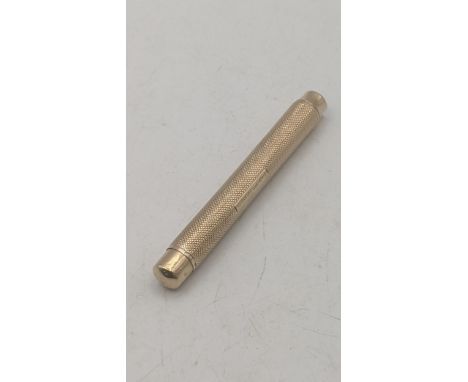 An 9ct yellow gold propelling pencil having a engine turned design engraved Lionel a Martin A/FLocationIf there is no conditi