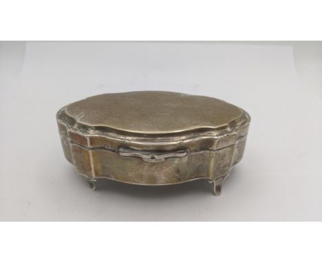 A silver oval shaped ring box on four feet, hallmarked Birmingham 1944Location: If there is no condition report shown, please