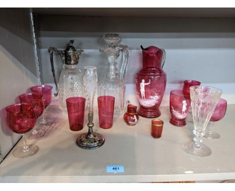 A selection of Victorian glassware to include a cranberry Mary Gregory enamelled water jug and matching tumbler, along with a